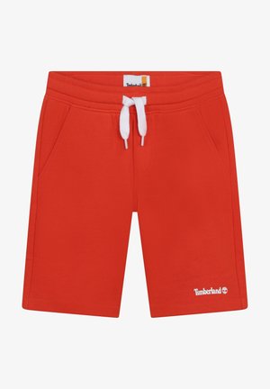 Shorts rouges Timberland avec taille à cordon blanc et poches latérales, logo Timberland sur l'ourlet de la jambe gauche.