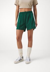 adidas Originals FIREBIRD - Trainingsbroek - collegiate green