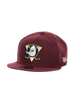 Maroon snapback cap featuring a black and white penguin logo with yellow crossed hockey sticks, textured fabric, and flat brim design.