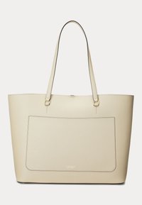 Kremna usnjena torba tote z dolgimi ročaji, sprednjim žepom in majhnim zlatim napisom "Lauren" blizu spodnjega sredinskega dela.