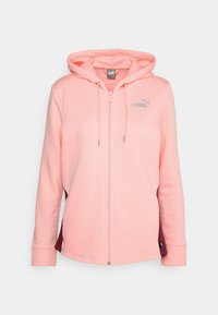 Sweat à capuche zippé Puma rose clair avec capuche et cordons, avec petit logo Puma argenté sur la poitrine et panneaux latéraux rose foncé.
