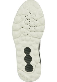 Suela de zapato blanca con un patrón texturizado. Presenta grandes protuberancias circulares, ranuras y un acento negro de goma con un diseño ondulado. Logo de GeoX presente.