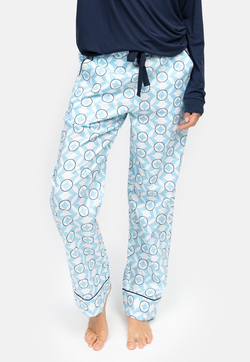 Pantalons de pyjama bleu clair avec un motif circulaire en bleu foncé et blanc. Fabriqués en tissu doux, ils disposent d'une taille élastique avec un cordon de serrage.