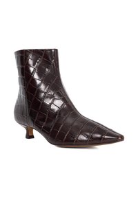 Brown, faux crocodile leather ankle boot with a pointed toe, low kitten heel, and smooth, shiny texture featuring a grid pattern.