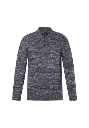 Tummanharmaa ja valkoinen marled-neulepuvun neuletakki, jossa on pitkät hihat ja kolme nappia henley-kauluksessa.