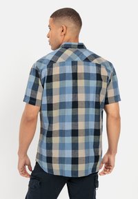 Korte mouwen geruiten overhemd met blauw, beige en zwarte ruiten. Button-down kraag en rechte zoom. Katoenmix stof, met een gestructureerde afwerking.