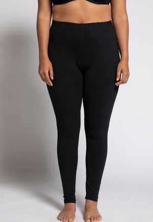 ENGANLIEGENDE JERSEY - Leggings - Trousers - schwarz