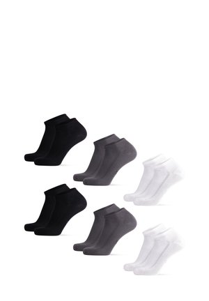 Tre par ankelsockor: två svarta, en mörkgrå och två vita, med en mjuk textur och subtila ribbade muddar.