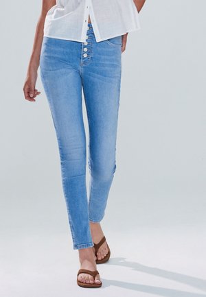 Karcsúsított farmerek - mid blue denim