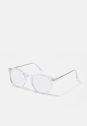 Clear round-frame glasses with transparent plastic lenses and silver metal arms. Minimalist design with subtle detailing at the hinge.