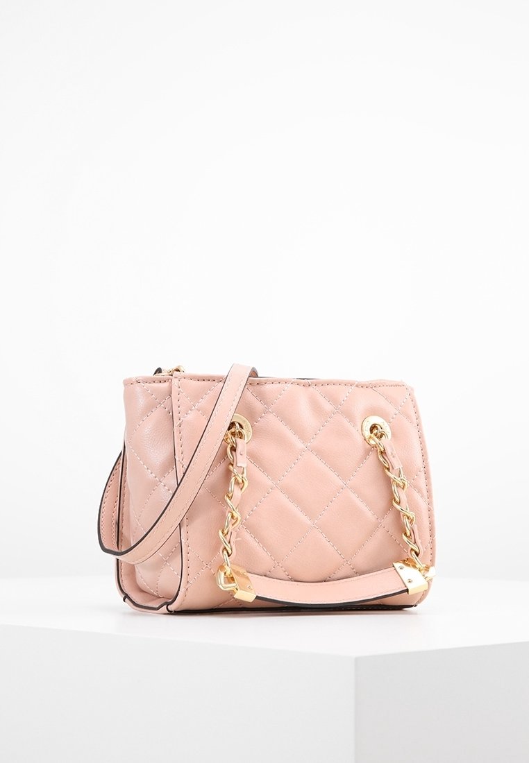 Pink quilted leather handbag with gold hardware. Features a chain strap, two handles, and a structured design. Smooth texture with a shiny finish.