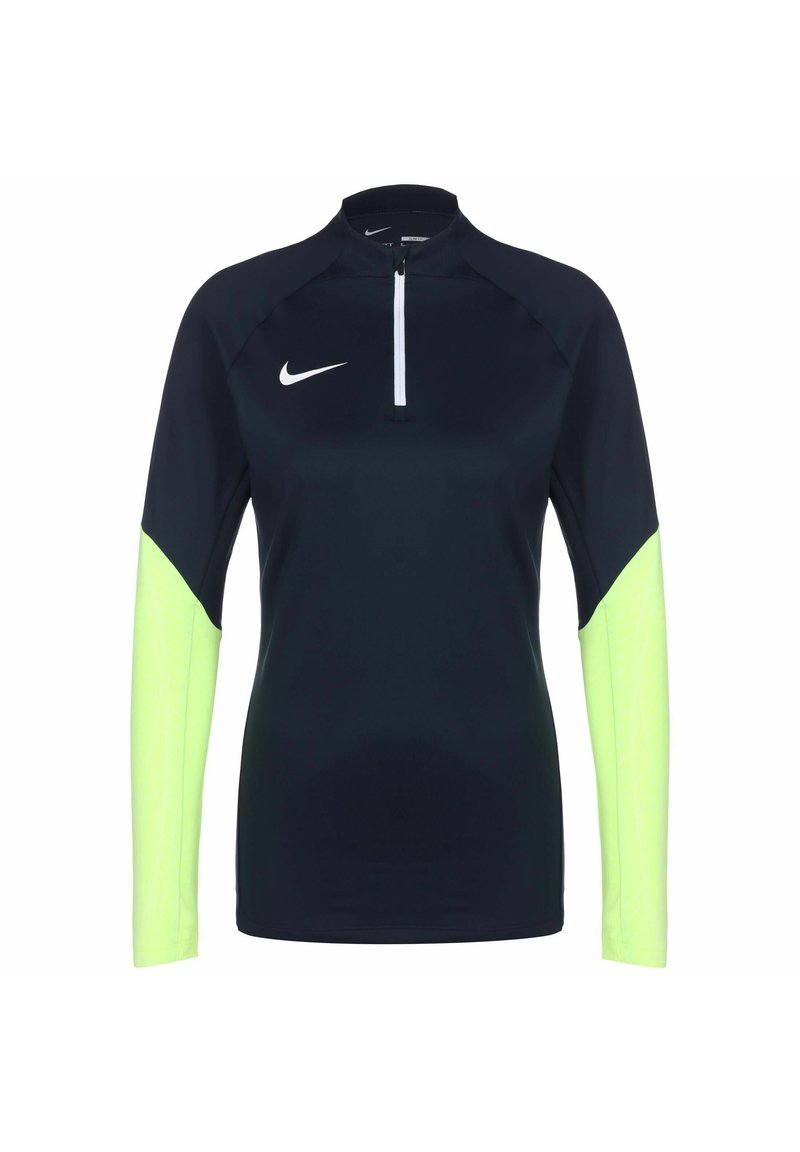 Top sportivo a maniche lunghe di colore blu scuro con maniche verdi neon. Presenta un colletto alto e una chiusura a zip quarti. Realizzato in tessuto leggero e elasticizzato.