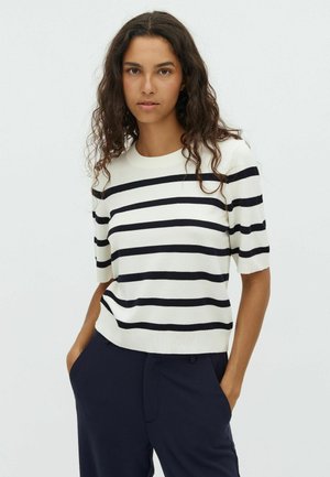 Knitted short-sleeve sweater in cream with navy horizontal stripes, featuring a round neckline and a relaxed fit.