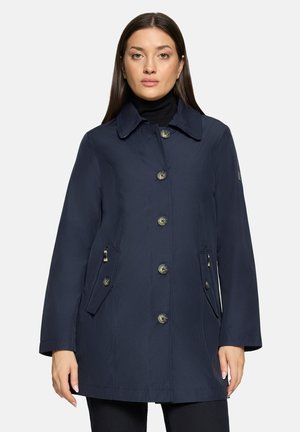 Marineblauer Mantel mit Kragen, vorderer Knopfleiste und zwei Reißverschlusstaschen. Verfügt über eine glatte Textur und eine schlanke Silhouette.