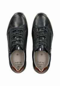 Scarpe in pelle nera con dettagli in marrone a contrasto, dotate di lacci, cerniera laterale e suola testurizzata. Taglia 42 indicata all'interno.