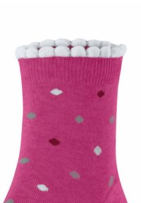 Roze sok met een geribde witte boord, voorzien van kleine stippen in lichtgrijs, donkergrijs, rood en wit, gemaakt van een zachte gebreide stof.