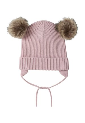 Pink ribbed knit winter hat with two brown faux fur pom-poms, ear flaps, and ties for securing under the chin.