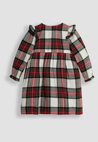 Ruudullinen mekko, jossa on punaisia, vihreitä ja valkoisia värejä, pitkät hihat, rypytysviimeistely hartioilla ja kerätty vyötärösuunnittelu.