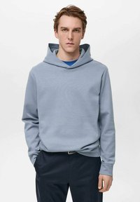 Light blue hooded sweatshirt made of soft fabric, featuring a relaxed fit and a simple design without patterns or noticeable hardware details.