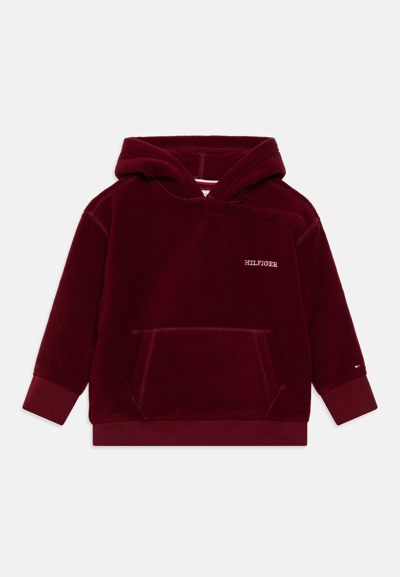 Sweat à capuche bordeaux en molleton doux avec une poche kangourou et des poignets côtelés. Logo "HILFIGER" brodé sur la poitrine.