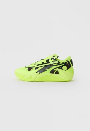 Neon green athletic sneaker with black abstract patterns, lace-up design, and a thick sculpted sole, shown in side profile on white background.