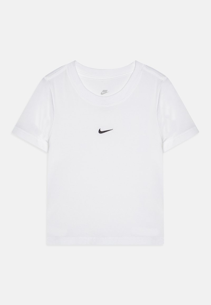 T-shirt branca cropped feita de algodão com uma textura suave, apresentando um pequeno logotipo preto da Nike no peito e mangas curtas.