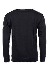 Zwarte sweatshirt met lange mouwen, ronde hals, geribde manchetten en zoom, met een patchdetail op de linker mouw. Glad van textuur.