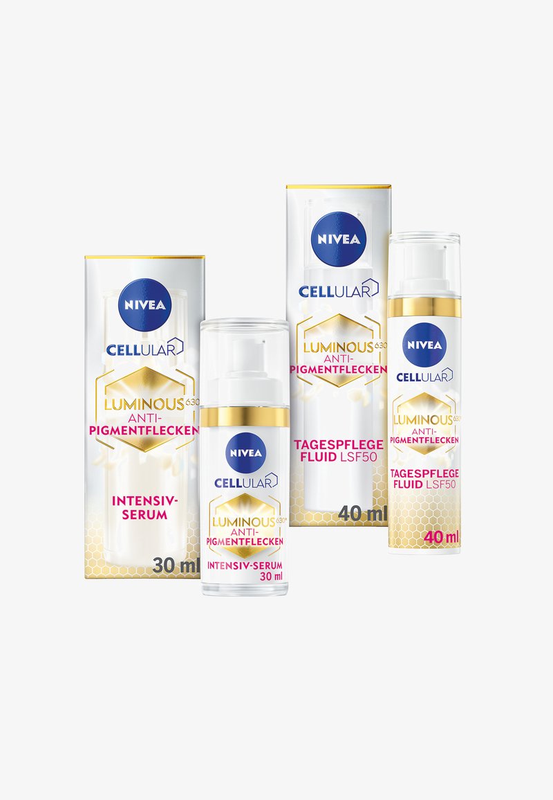 NIVEA Cellular skincare products include two white, pump-dispenser bottles and a box. Features gold accents and vibrant text on packaging.