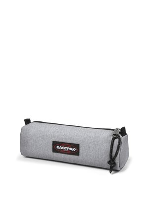 Grey pencil case made of textured fabric with a black zipper, featuring a prominent Eastpak logo patch on the side and a fabric loop.
