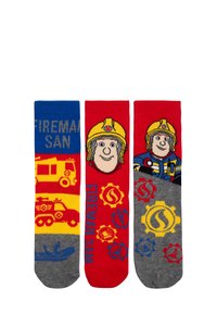 Tre paia di calze con Fireman Sam. Colori: blu, rosso, grigio. I testi e i design dei cartoni includono un camion dei pompieri, un pompiere e ingranaggi.