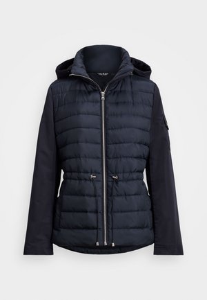 Navy puffer jacket with a zipped front, adjustable waist drawstring, and a hood; features contrasting smooth fabric sleeves and pockets.