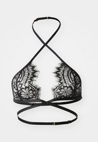 Sort spidsbralette med trekantede skåle og intrikate blomsterprint. Har justerbare krydsende stropper og en guldfarvet hardware detaljer.