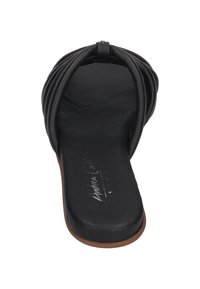 Black leather slide sandal with a rounded toe, soft gathered design, and a flat sole. Textured insole with branding detail.