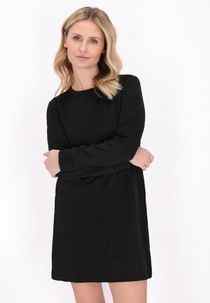 Abito nero a maniche lunghe con un motivo testurizzato e scollatura rotonda, che si ferma sopra la metà della coscia, con vestibilità comoda e tessuto morbido.