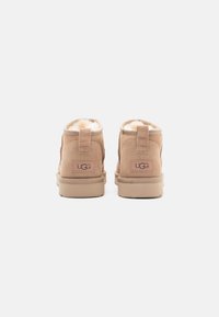 UGG CLASSIC ULTRA MINI - Ankle Boot - sand