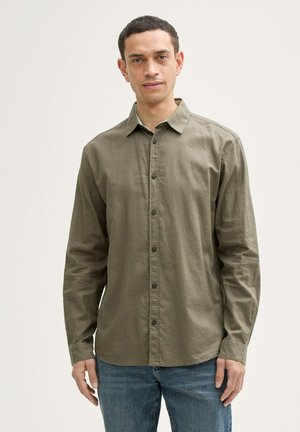Olive green long-sleeve shirt with a button-down front, made of a soft fabric, featuring a classic collar and tailored fit.