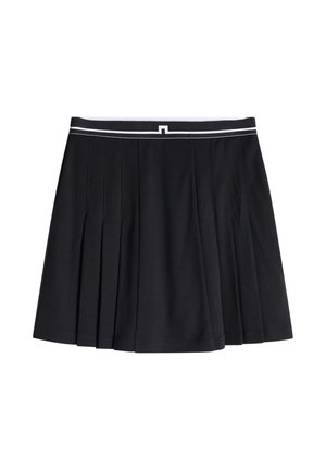 Gonna nera plissettata con fascia in vita a strisce bianche e piccolo dettaglio rettangolare al centro davanti, esposta distesa su sfondo bianco.