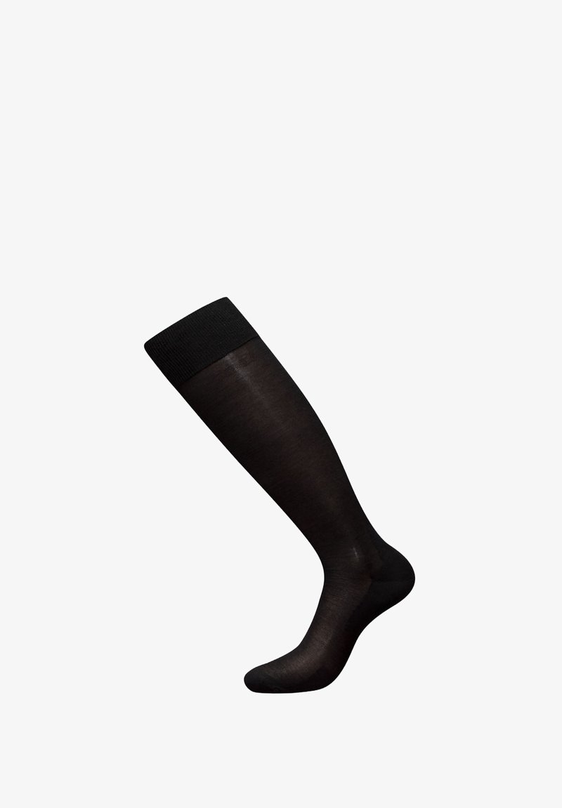 Opaque schwarze Kniestrümpfe mit einem gerippten Muster am oberen Teil und glattem Finish. Entwickelt, um eng am Bein zu sitzen.