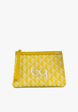 Pochette da polso con motivo giallo e bianco, con una cerniera gialla e un logo bianco stilizzato "BYB" sul davanti.
