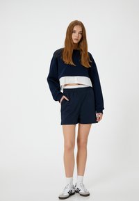 Koton Verryttelyhousut - dark blue