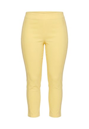 Pantalon jaune clair ajusté, longueur cheville, taille haute, en tissu lisse, présenté sur fond blanc.