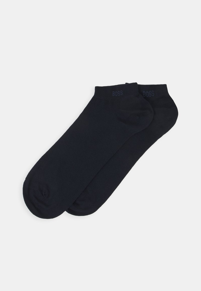 Black ankle socks made of a smooth fabric, featuring reinforced toes and a subtle logo on the cuff. Comes in a pair.