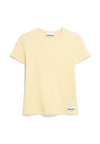 Žluté tričko s krátkým rukávem z žebrované látky. Má kulatý výstřih a malou značkovou etiketu v levém dolním rohu.