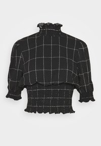 Sort cropped bluse med hvidt rutemønster, struktureret stof, voluminøs hals og smocked kant. Korte, puffede ærmer med bølgede kanter.