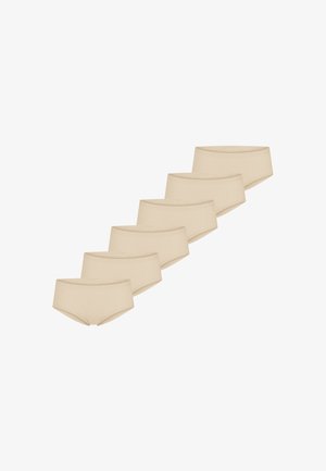 Six culottes beige sans couture pour femmes disposées en ligne diagonale sur un fond blanc.
