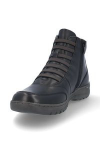 Botas de cuero negras hasta el tobillo con punta redondeada, con destacados acentos de costura, cordones y una cremallera lateral para facilitar su uso.