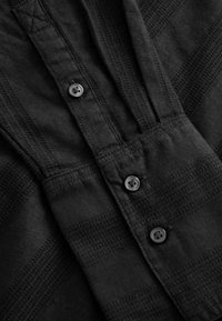 Next Paitapusero - black