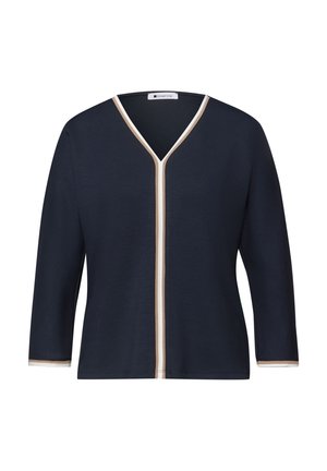 Marineblauwe cardigan met lange mouwen en beige en witte biezen langs de V-hals, de voorkant en de mouwboorden.