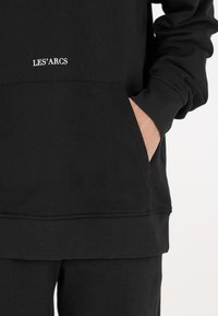 Les'Arcs Kapuzenpullover - zwart