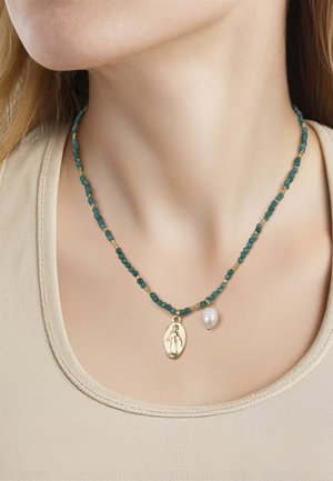 Yokoamii, Collar - gold-coloured